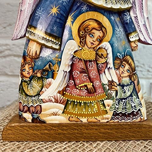 Dizajnerski drveni figuri božićni anđeo ljubavno je urezan i naslikao ruski umjetnici. Napravio rukom u
